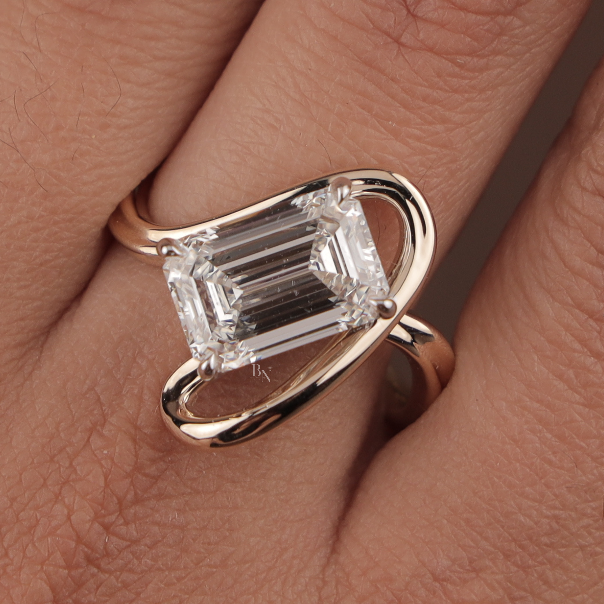 4ct Emerald Cut Lab Grown Diamond Engagement Ring | 14K Rose Gold East West Tension Setting | Swirl Bypass Solitaire | IGI Certified Jewelry (Copy)