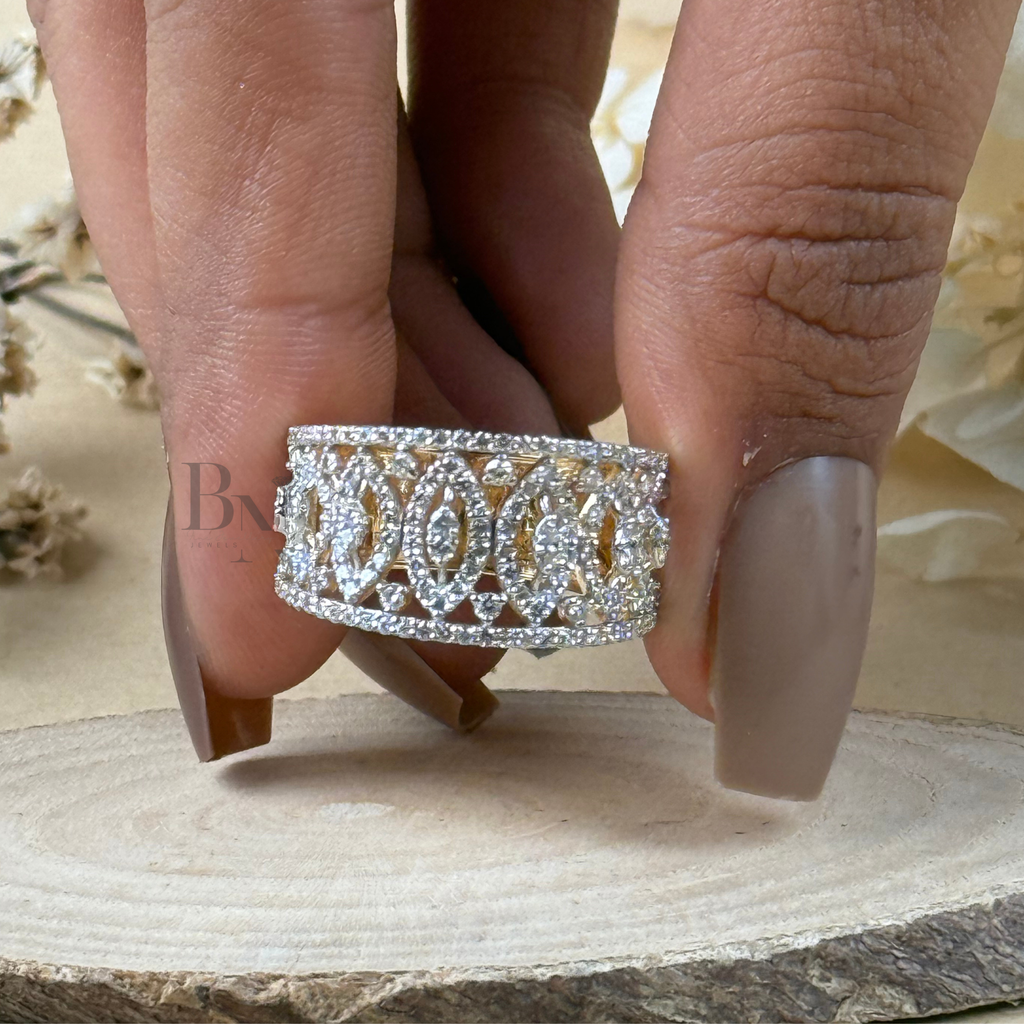 Wide 14k yellow gold wedding band featuring an intricate Art Deco filigree pattern of marquise and round lab grown diamonds in a pavé geometric lattice design.