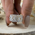 Wide 14k yellow gold wedding band featuring an intricate Art Deco filigree pattern of marquise and round lab grown diamonds in a pavé geometric lattice design.