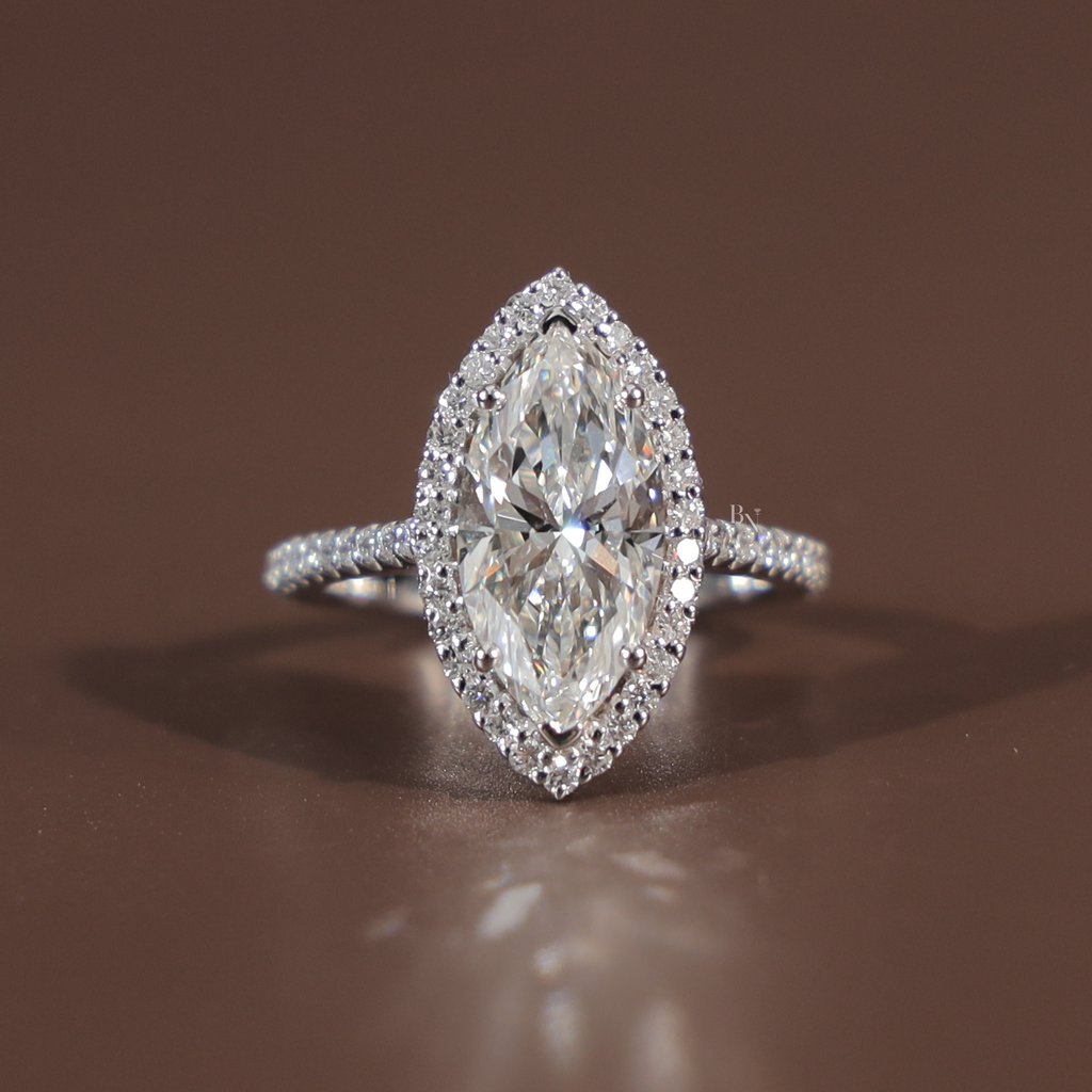 3 carat marquise cut lab grown diamond engagement ring in 14k white gold featuring a brilliant diamond halo and a slim pave encrusted band showing high-set cathedral profile and icy white Type IIa clarity.