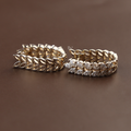 Detailed view of 0.70 carat lab grown marquise diamond huggie hoop earrings in 14k yellow gold featuring a nature-inspired double-row leaf vine pattern with sparkling brilliant white diamonds for a luxury bridal or anniversary jewelry gift.