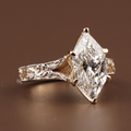 3 carat dutch marquise lab grown diamond engagement ring in 14k yellow gold with intricate engraved filigree band, vintage inspired statement ring for proposal.