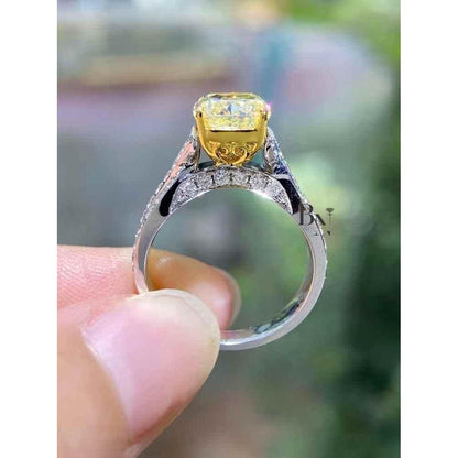 Cushion Cut Fancy Yellow Lab Grown Diamond Engagement Ring with a Twisted Pave Infinity Band in 14k Two-Tone Solid Gold.