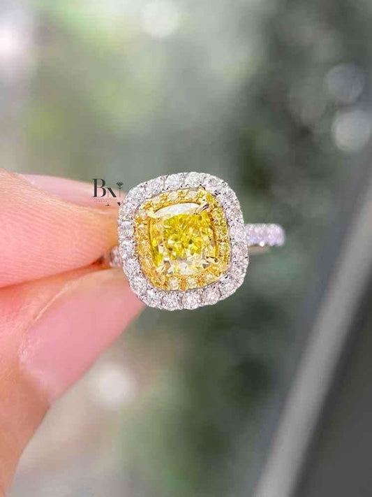 Cushion Cut Fancy Intense Yellow Lab Grown Diamond Engagement Ring with a Double Halo and Pave Band in 14k Two-Tone Gold.