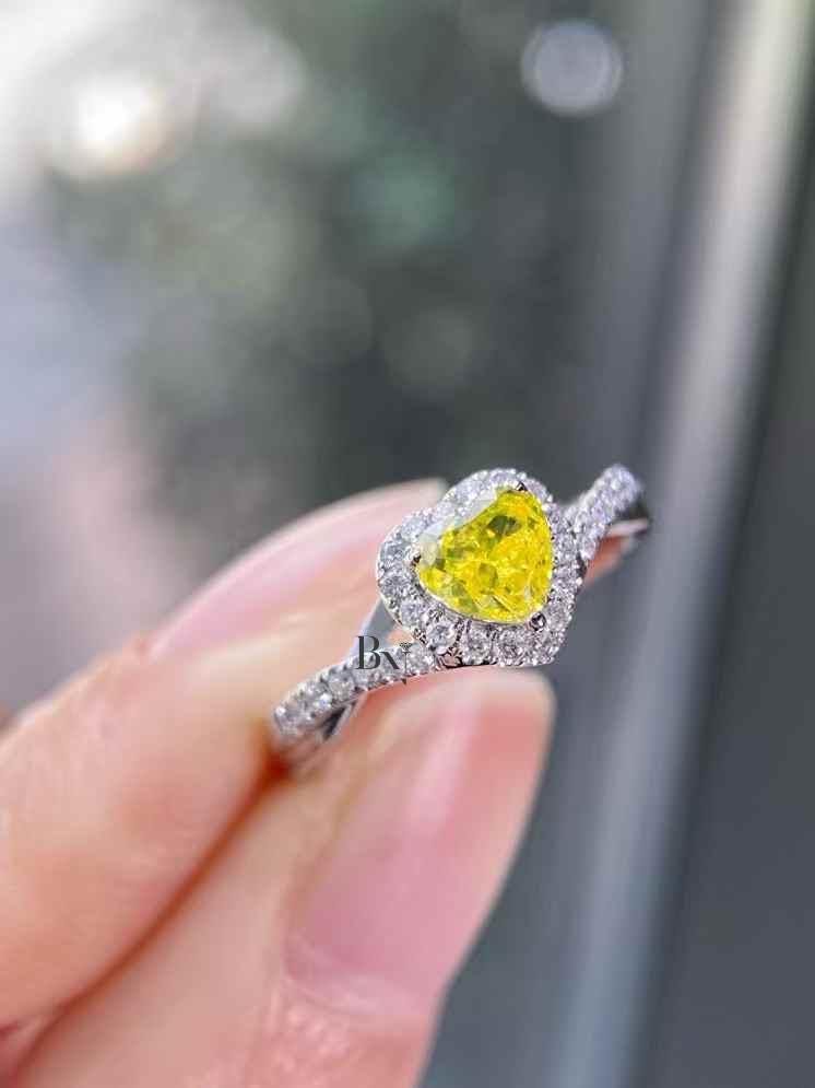 0.73 TCW Yellow Diamond Heart Ring | Lab Grown Diamond Engagement Ring | Fancy Yellow Heart Shape | Twisted Pave Infinity Band