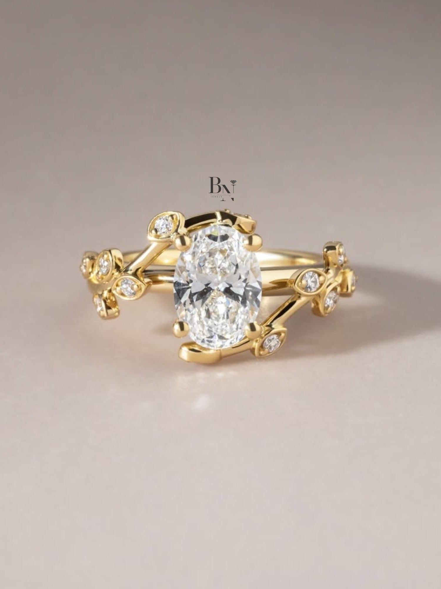 Exquisite 1.50ct oval lab grown diamond engagement ring in 14k white gold. Features a minimalist band, four prongs, and a hidden halo of diamonds visible from the side profile.