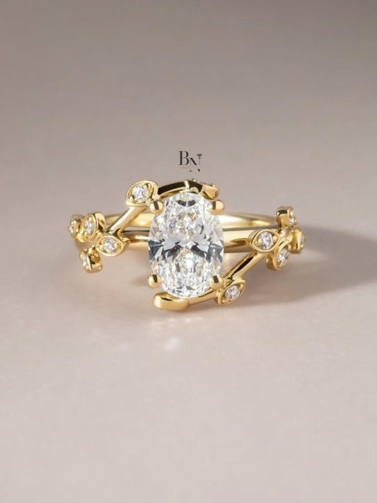 Exquisite 1.50ct oval lab grown diamond engagement ring in 14k white gold. Features a minimalist band, four prongs, and a hidden halo of diamonds visible from the side profile.